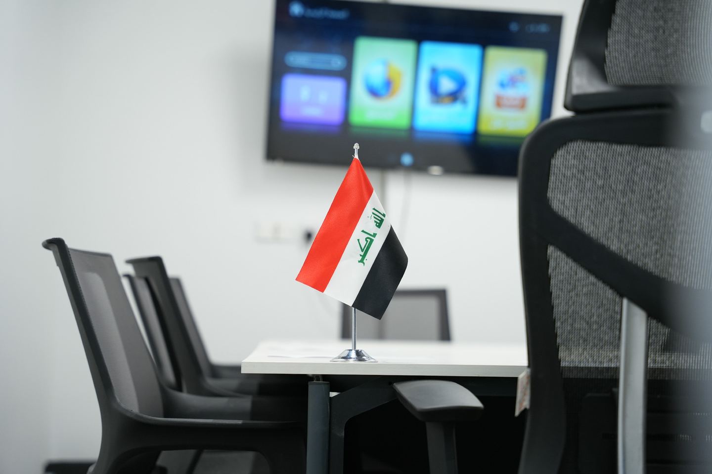 Meeting room detail with chairs and display